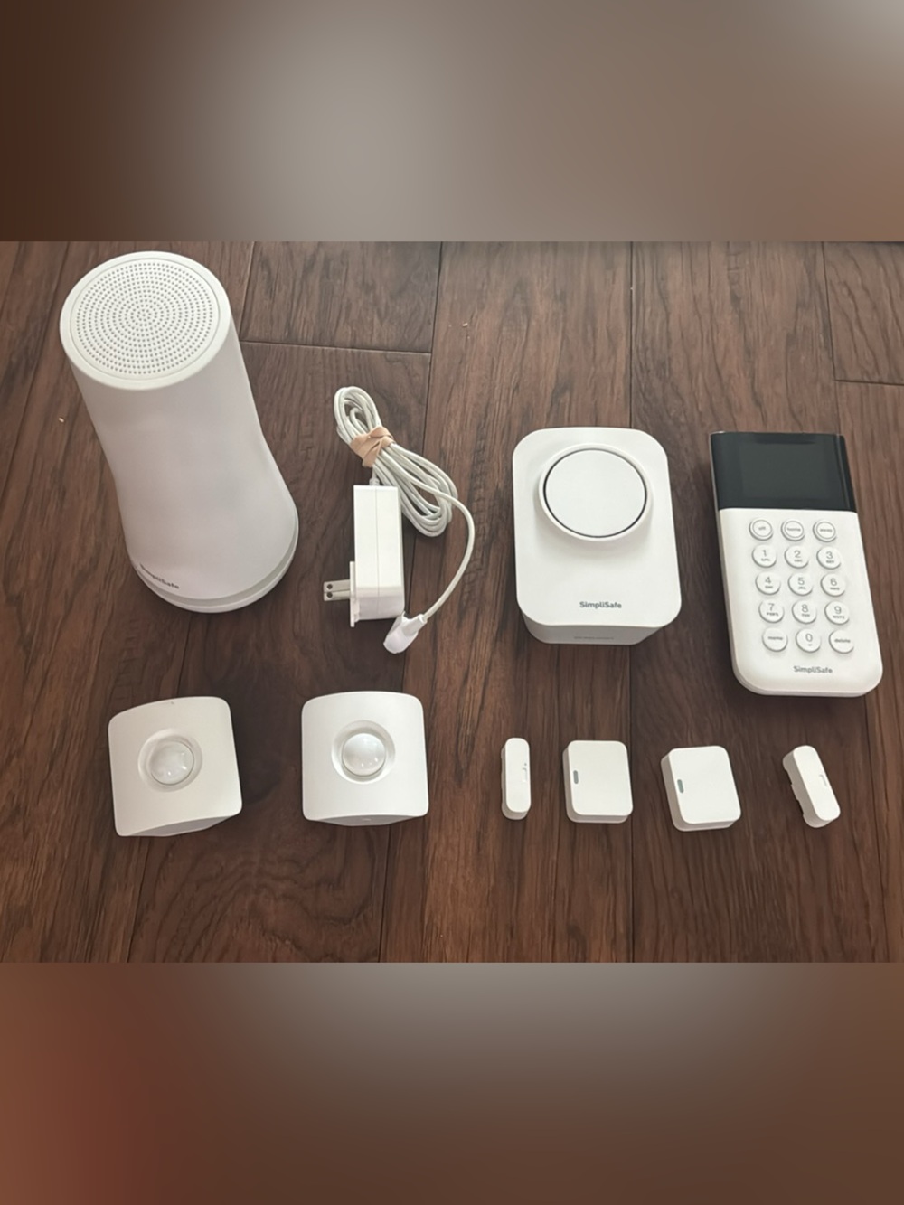 White SimpliSafe Smart Home Security System Sensor and Hub Set